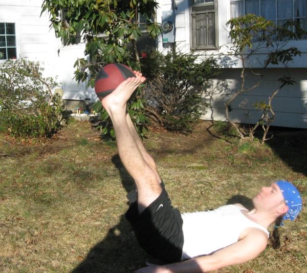 Medicine Ball Straight Leg Raises