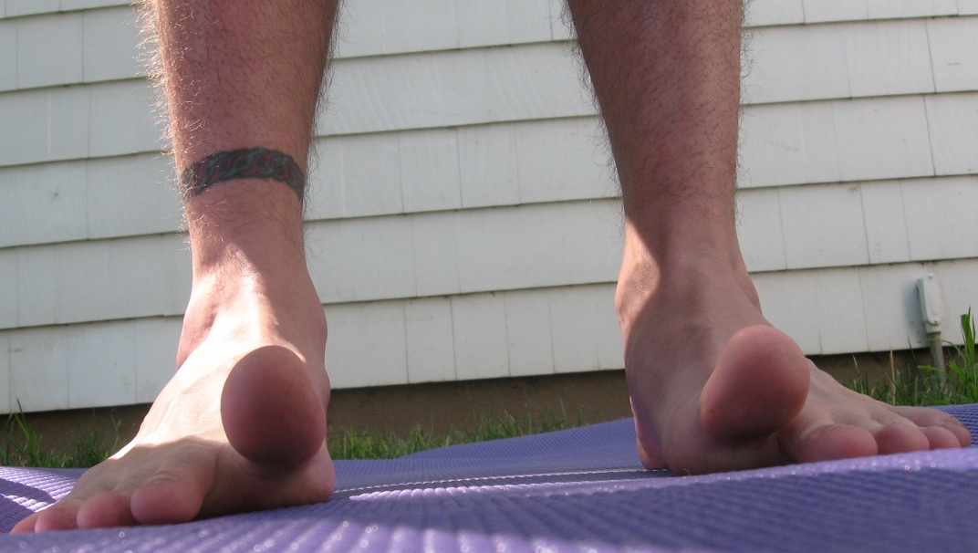 Bare foot with big toes lifted
